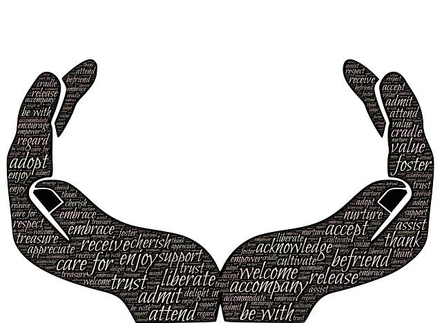 Illustration of two hands together, with inspirational words written across the hands.